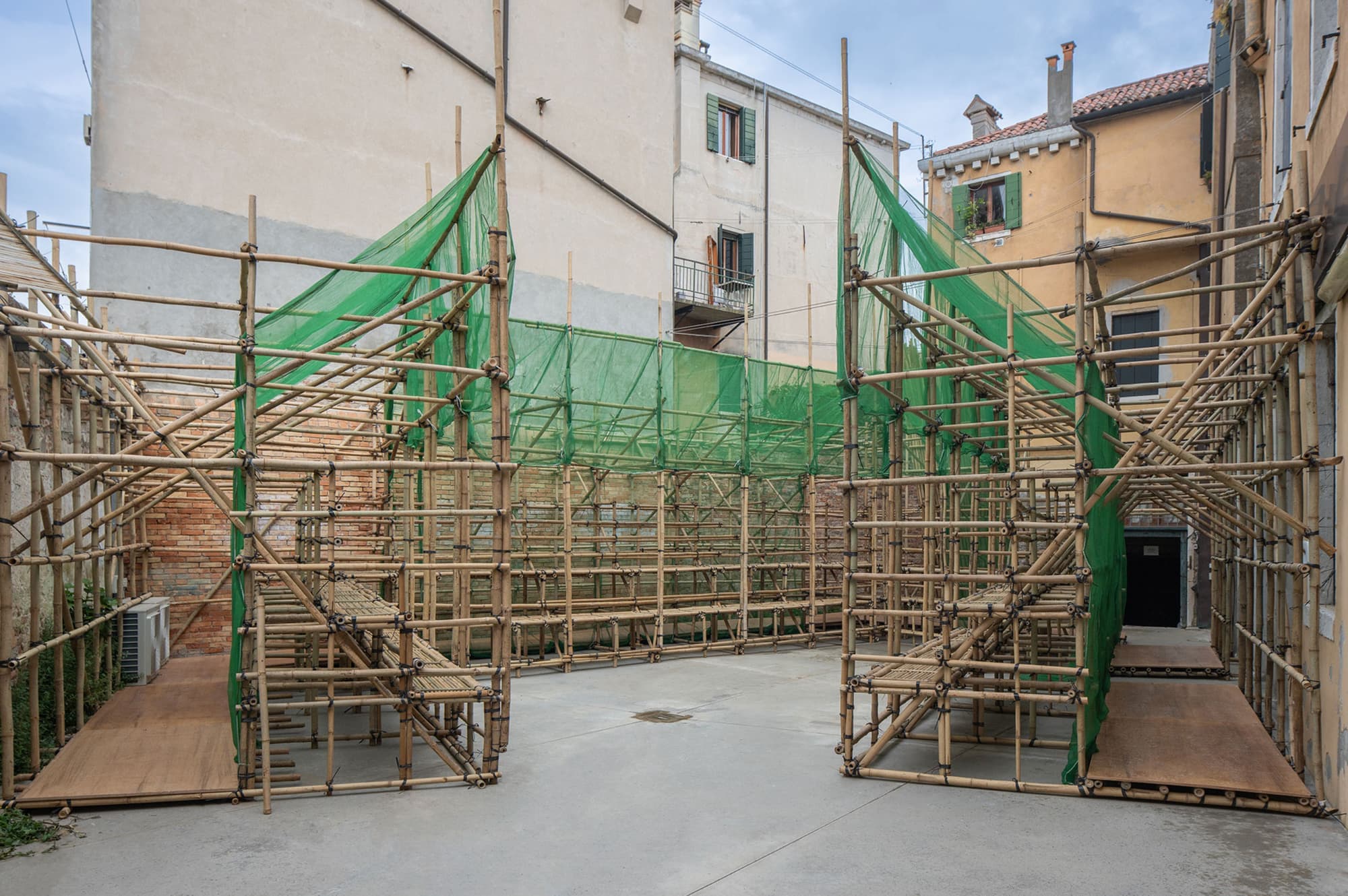 Installation of a bamboo structure at the HK Pavilion. -Photo by Oliver Yin Law-